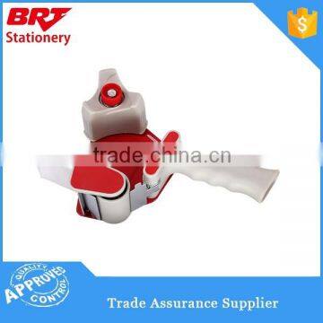 Red color hand held packing tape dispenser