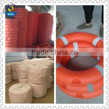 orange plastic life buoy