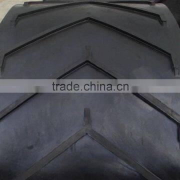 Strict standard ribbed conveyor belt