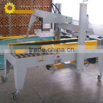 Semi-Automatic Flaps Folding And Side Belts Driven Sealer