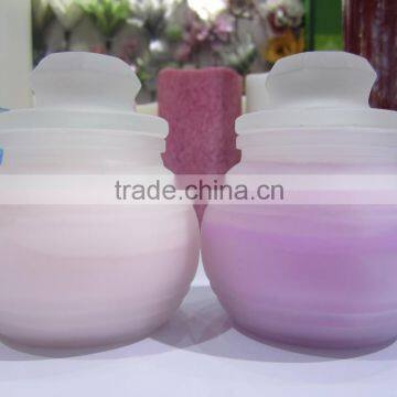 candle in glass jar