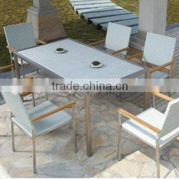 white color rattan chair and table