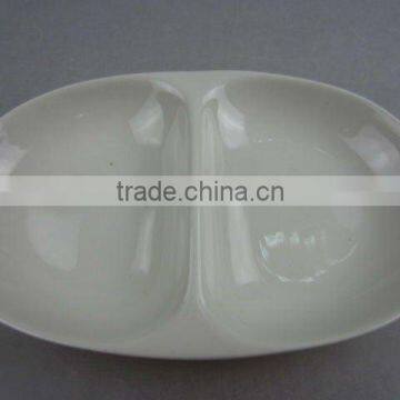 Stock white porcelain two division oval sauce dish