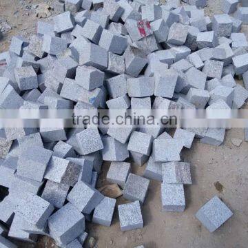 grey granite small blocks, natural surface, paving stone