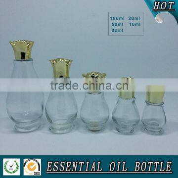 Clear single-gourd shape glass essential oil bottle with flower cap