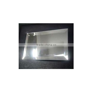 Frameless bevelled edge mirror