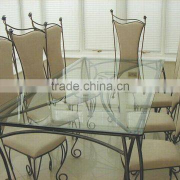 wrought iron dining chairs and table