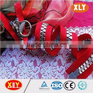 xly hot sale long sliver teeth zipper , plastic zipper