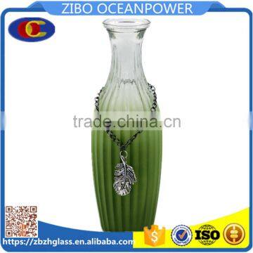 thin green glass vase