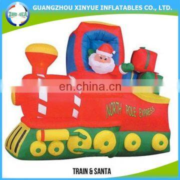 2014 hot selling outdoor inflatable christmas santa in train