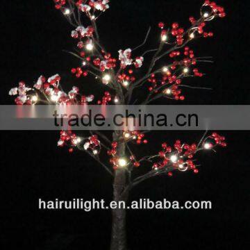 36L tree light with snowy berry