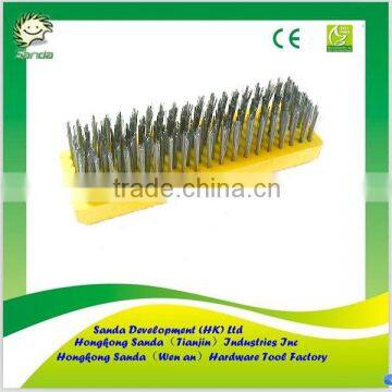 yellow plastic block wire brush