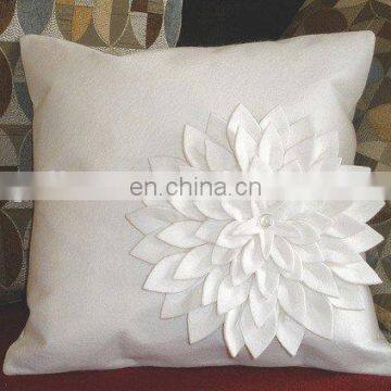 cushion cover with appliqued flower shape