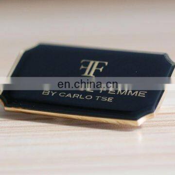 square shaped black custom metal clothing labels