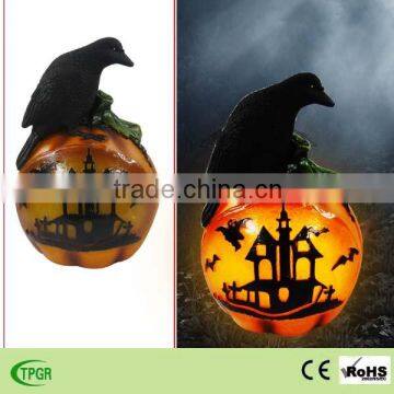 polyresin crow sitting on the pumpkin led solar lights halloween ornament