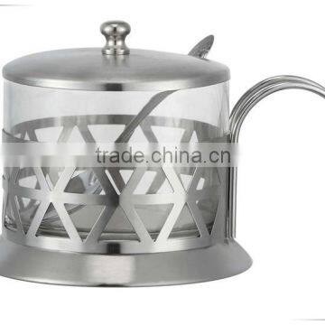 Stainless steel and glass suger pot with a spoon