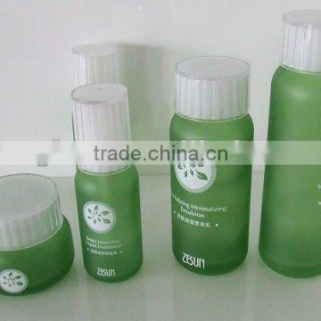 green cream glass container