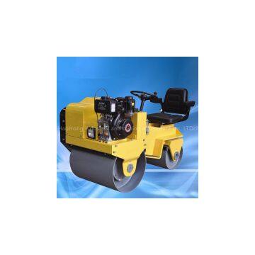 Ride-on double drum vibratory road roller compactor