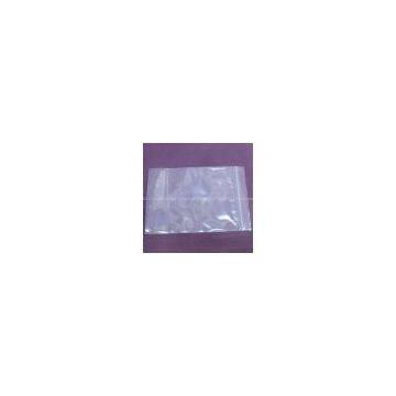 Self-sealing transparent plastic bag