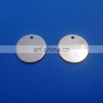 Shiny engraved logo round brass tag