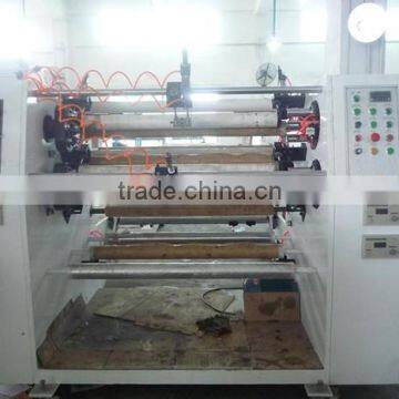 Slitting and rewinding machine for supper clear stationery tape