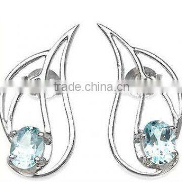 0.65ctw Genuine Blue Topaz Oval .925 Sterling Silver Stud Earrings