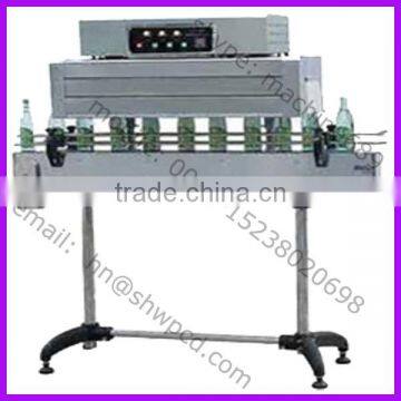 Bottle cap heat shrink machine/bottle shrink wrap price/pet bottle shrink wrapping machine