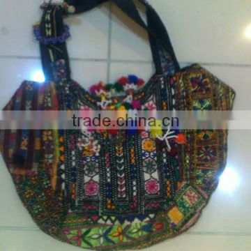 tribal ethnic bags with embroidery, tassels, pom-pom and coin