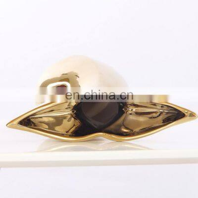 Ceramic Artwork of Golden Whale Tail Ornaments photo-3