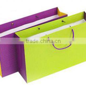 elegant die cut paper bag contrasting colors 2014