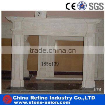 Freestanding white marble fireplace