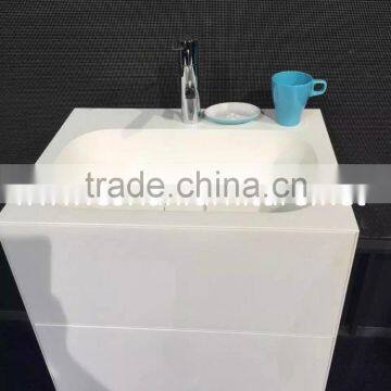 One piece shaped Corian free standing basin