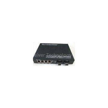 Low Power 4w 1000m TP Fiber Optic Switch Box 4 Port Supports Vlan And Qos