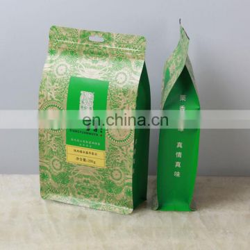 Custom 250g flat bottom 8 side seal plastic bag with zipper and handhole for tea packaging