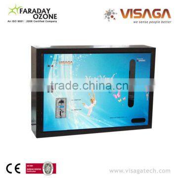 Small sanitary napkin dispenser/vending machine