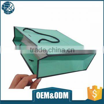 Low cost fashion small Luxury Shopping paper bag