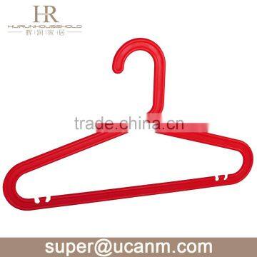 red kids plastic clothing hanger