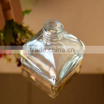 Glass perfume bottle with square bottom