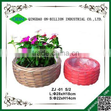 Hand woven plastic liner wicker basket for plants