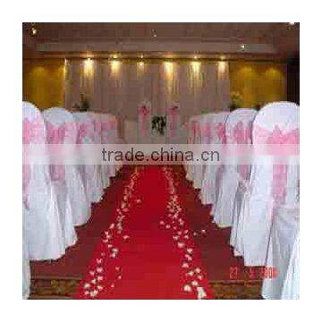 White chair cover with pink sash