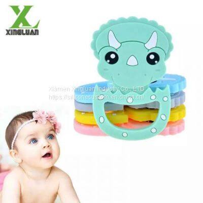 Cartoon Triceratops Children's Chew Toys Safe Food Grade Silicone Baby Molars photo-3