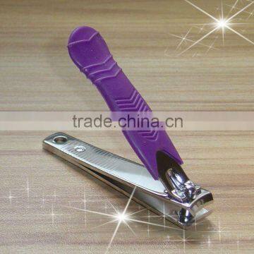 Sharp nail cutting tool with second injected handle