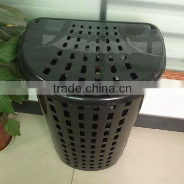 Plastic laundry basket with lid