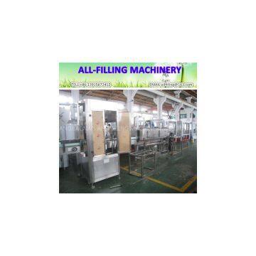 Automatic bottle shrinking labeler machine