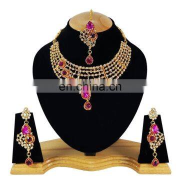 One Sided designer Pink Color Stone Gold Plated Kundan Zerconic Necklace Earrings Tikka