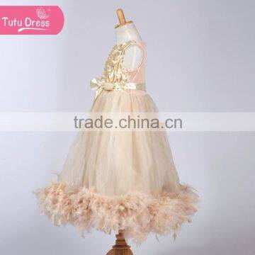 The Ivory Color Girls Boutique Dress With Fluffy Feather