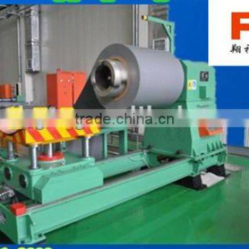 hydraulic steel coil rewinder with hold down arms