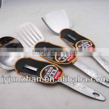 Stainless slotted turner with SS handle with rose on and low price