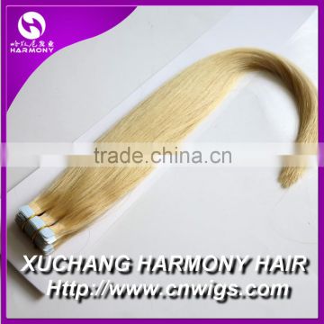 Harmony blonde tape human hair in 20" #613 color on stock always