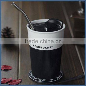 Modern Simple Ceramic Travel Coffee Mug With Silicone Sleeve and Lid photo-2
